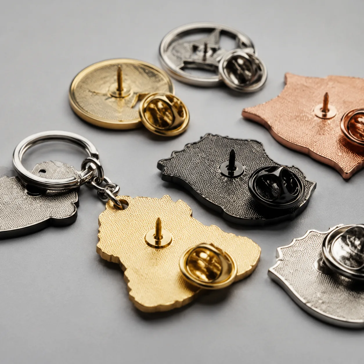Split-Run Specs for Custom Pins, Coins and Keychains